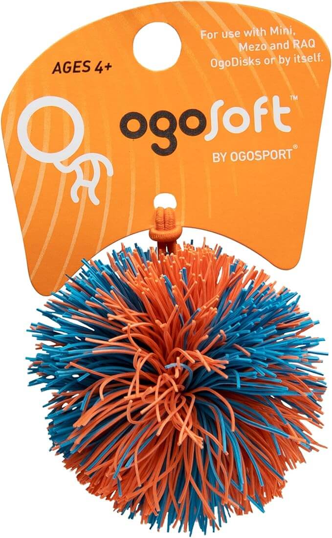Orange and blue rubbery filament ball attached to an orange OgoSoft cardboard retail display tag.