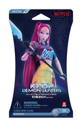 A sealed foil pack of K-Pop Demon Hunters trading cards with a pink-haired character holding a blue spear.