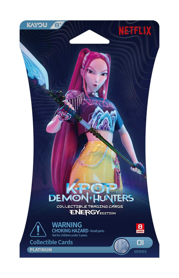 A sealed foil pack of K-Pop Demon Hunters trading cards with a pink-haired character holding a blue spear.