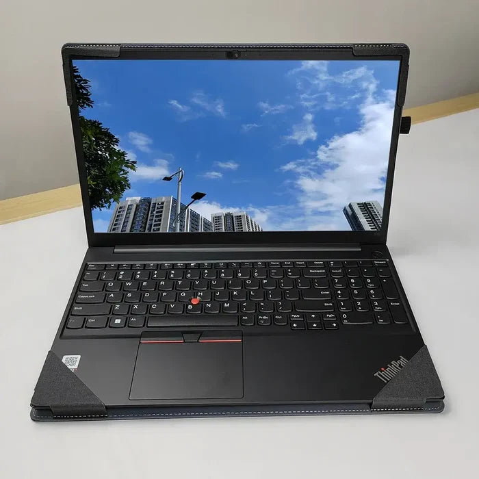 Lenovo ThinkPad E15 Gen 3 series laptop on a table, blue sky reflected on screen, perfect fit for Laptop Sleeve by Nauxlu, no zipper closure.