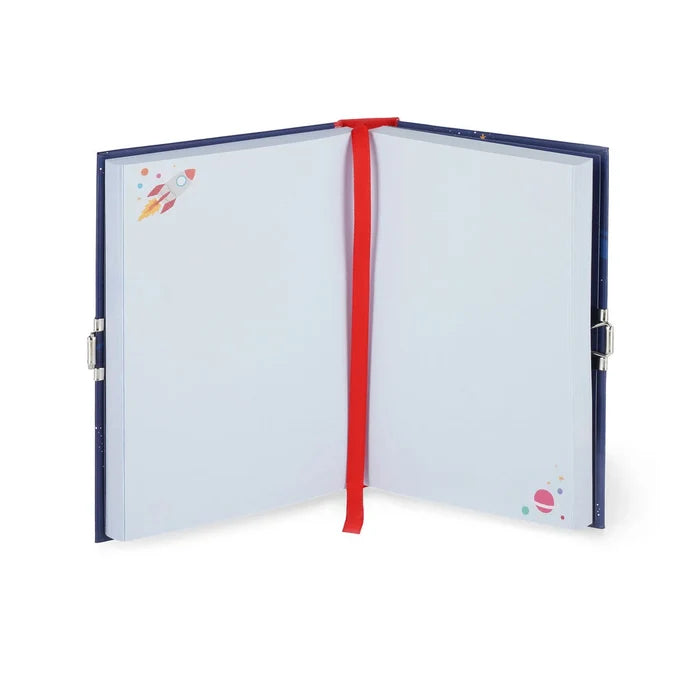 Open blue diary with blank pages, rocket and planet graphics, red ribbon bookmark, and metal side latches.