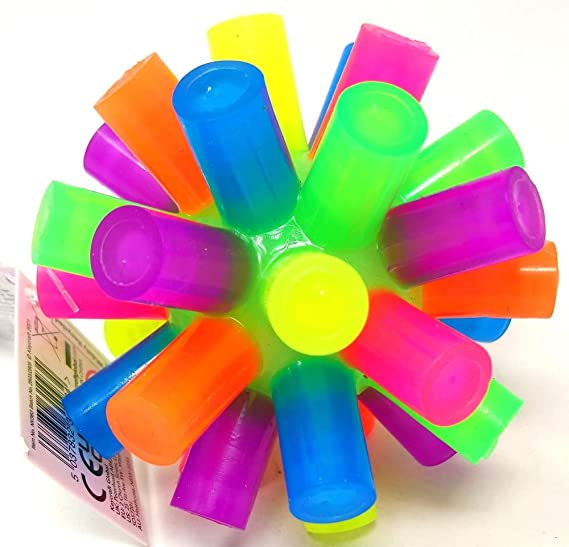 Neon multicolored ball with soft cylindrical spikes in pink, orange, yellow, green, and blue. Includes a barcode tag.