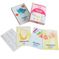 Pink box of trilingual music flashcards with colorful illustrations of a harp, xylophone, and concertina.