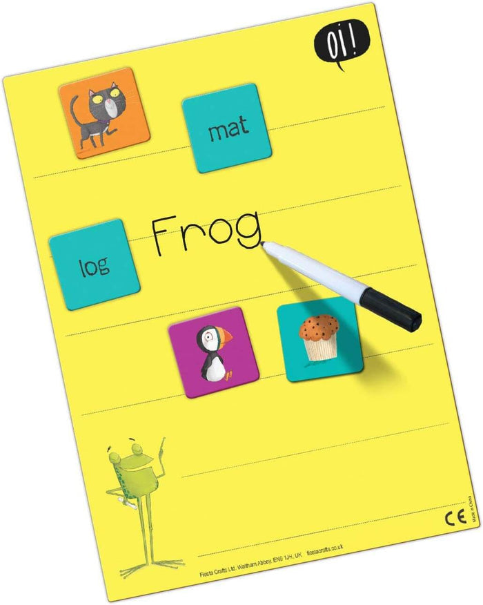 Yellow magnetic activity board with rhyming word and picture tiles. A marker writes the word Frog next to a log tile.