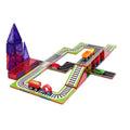 Colorful magnetic tiles and rail toppers forming a track layout and purple tower with small toy vehicles.
