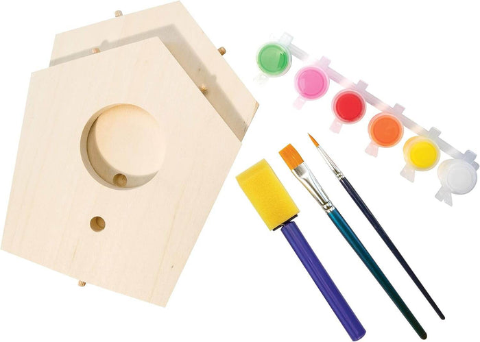 Unfinished wooden birdhouse parts with six colorful paint pots, a foam brush, and two detail paintbrushes.