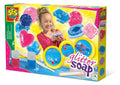 Colorful box for SES Creative Glitter Soap with pink and blue shaped soaps, a smiling girl, and craft supplies.
