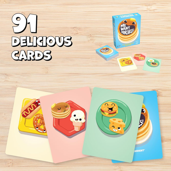 Blue game box and colorful cards featuring smiling cartoon food characters on a light wood surface.