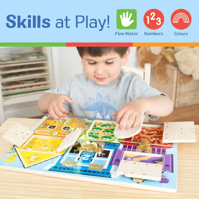 A child playing with a wooden activity board featuring colorful doors, metal latches, and hidden animals and numbers.