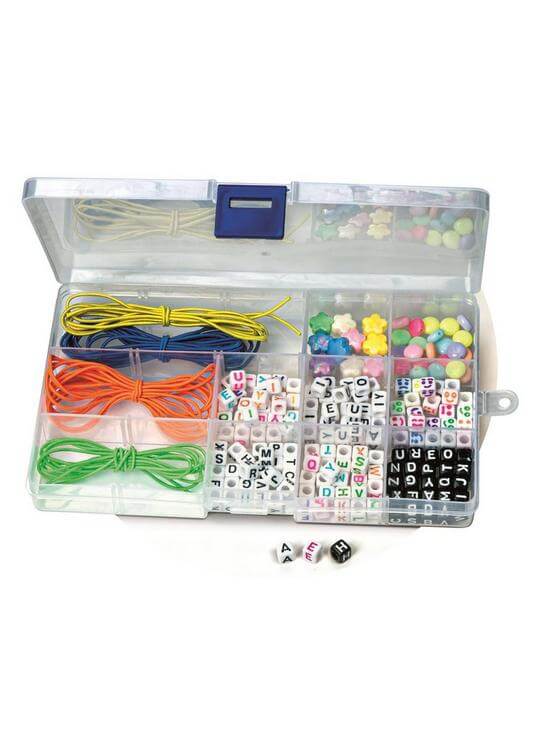 Open clear kit with colorful elastic cords and assorted alphabet and star-shaped beads in a compartmented box.