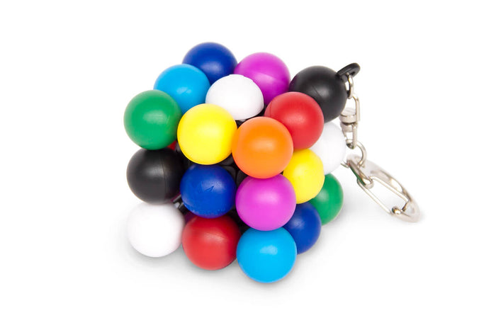 3x3 cube puzzle keychain made of bright, multi-colored plastic spheres with a silver metal clip.