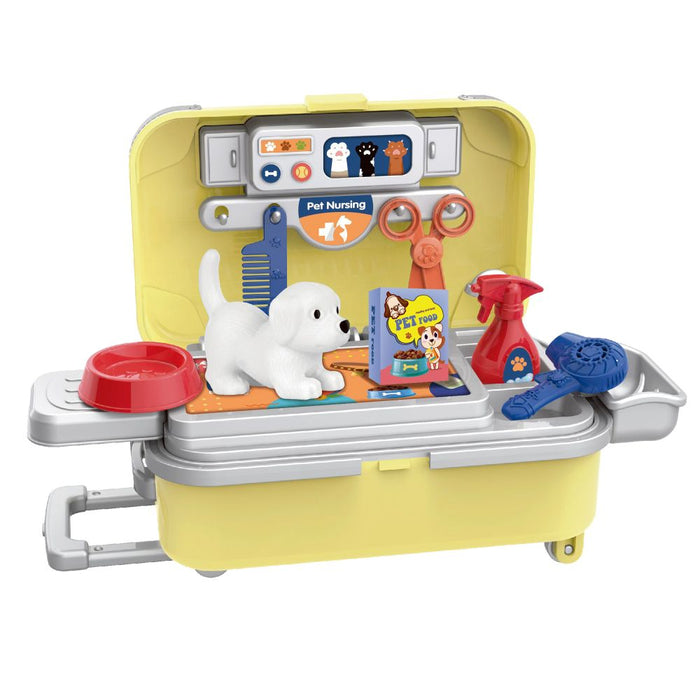 Yellow rolling toy suitcase opened to a pet care station with a white puppy, red bowl, and grooming tools.