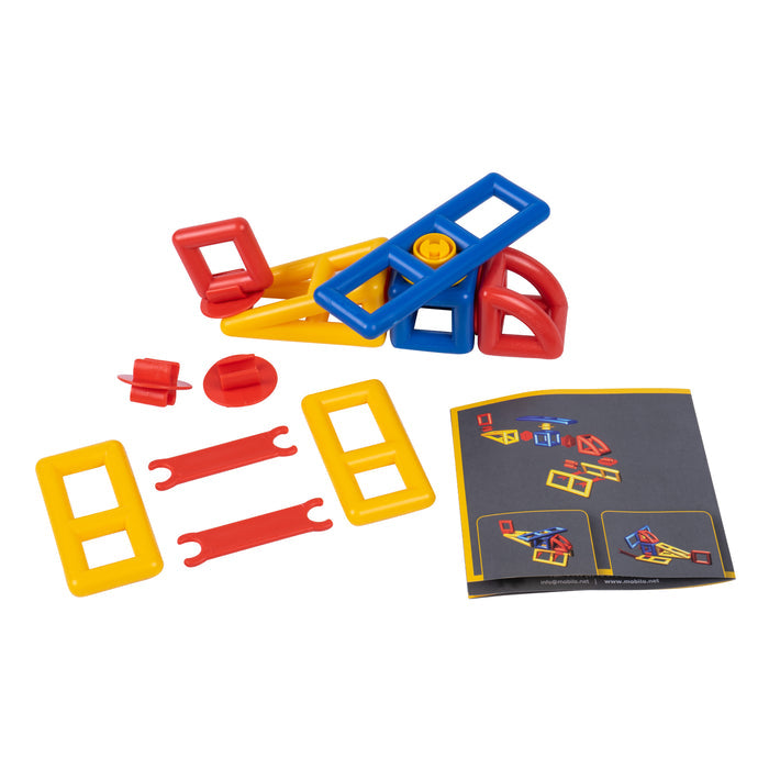 Red, blue, and yellow plastic geometric building blocks, frames, and connectors with an instruction manual.