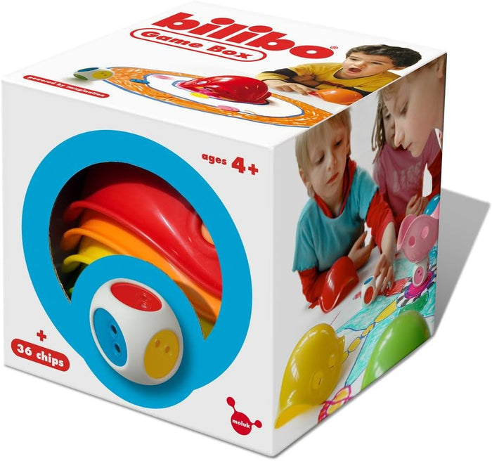 White game box featuring colorful nested shells visible through a cutout window, a large die, and photos of children.