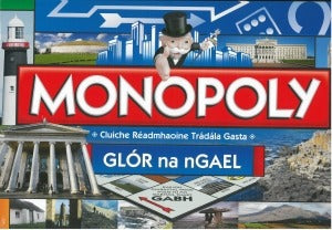 Irish language Monopoly box art featuring Mr. Monopoly, the Glór na nGael logo, and a collage of Irish landmarks.