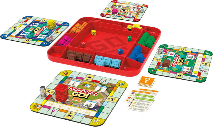 Monopoly GO! board game featuring a red tray, four square boards, colorful building blocks, silver tokens, and dice.