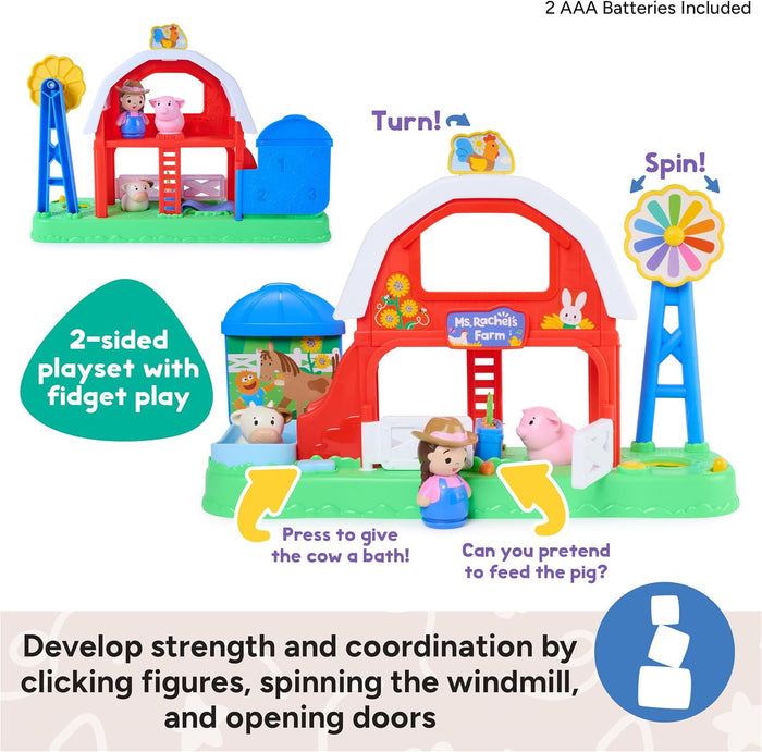 Two-sided red and white toy barn with a blue windmill, silo, farmer, and animal figures on a green base.