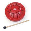 Red tongue drum with 8 numbered tongues and a single wooden mallet with a black rubber tip on a white background.