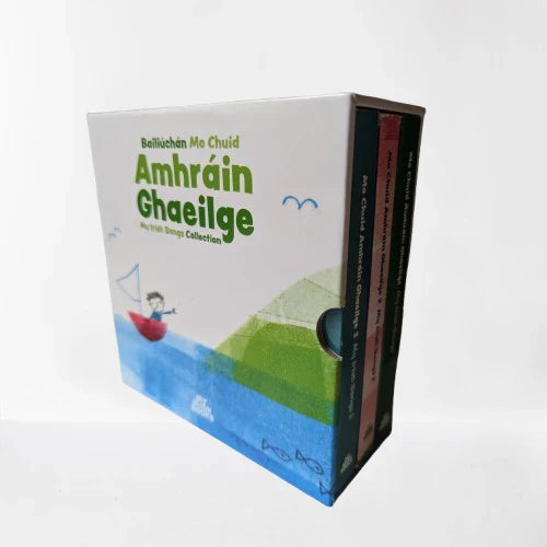 White box set with a red boat and green hill illustration, holding three books with colorful spines.