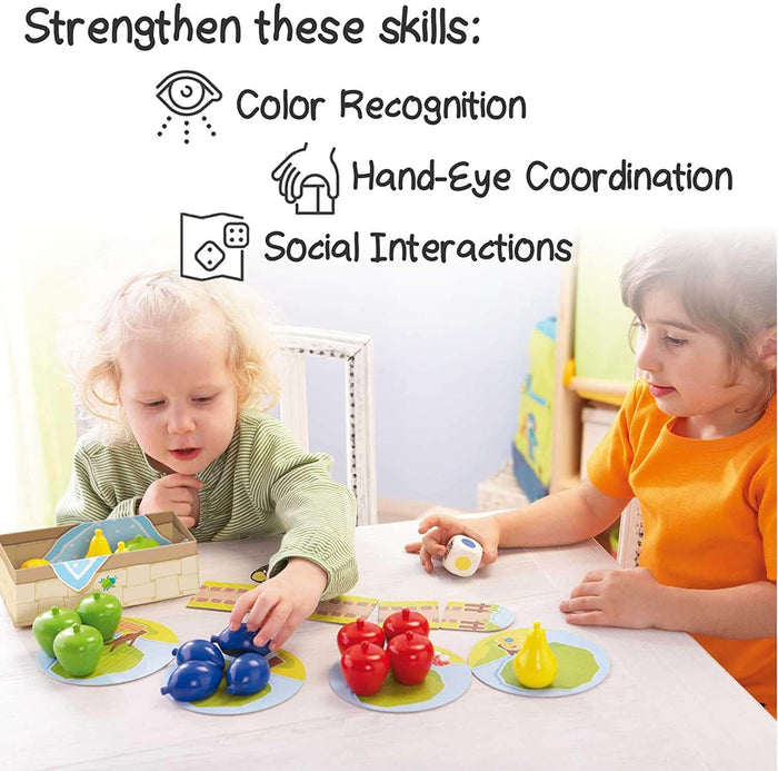 Two children play with colorful wooden fruit. Text highlights color recognition, coordination, and social skills.