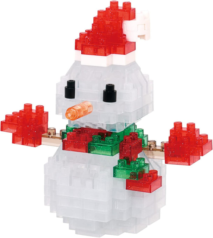 Snowman made of tiny building blocks with a red Santa hat, orange carrot nose, red mittens, and a green and red scarf.