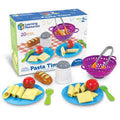 Play food set featuring plastic pasta, meatballs, bread, a purple colander, blue plates, and a cheese shaker.