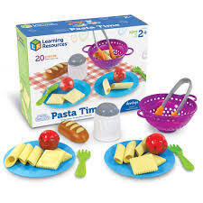 Play food set featuring plastic pasta, meatballs, bread, a purple colander, blue plates, and a cheese shaker.