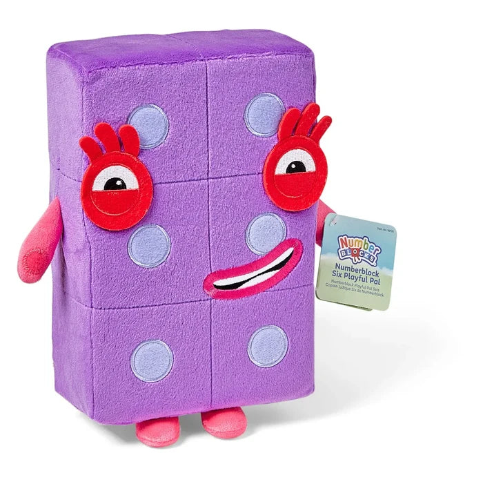 Purple six-segment block plush featuring die-like spots, large red eyes, pink limbs, and a smile with product tag.