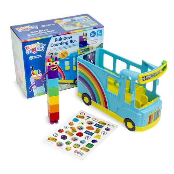 Blue toy bus with rainbow side, Numberblock Seven figure, and sticker sheet shown with its packaging box.