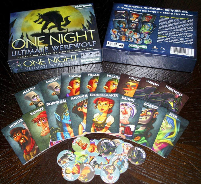 Game box with wolf silhouette, fan of colorful character cards, and round tokens on a dark wood surface.