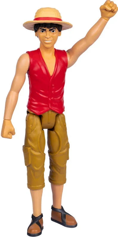 Articulated action figure in a red vest, straw hat, and tan pants, posing with one fist raised in the air.