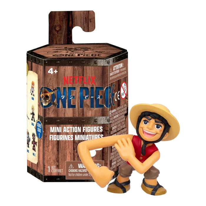 Hexagonal wood-grain One Piece blind box next to a Luffy figure with a long stretching arm, red vest, and straw hat.
