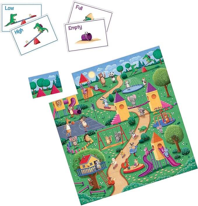 Colorful animal park floor puzzle with flashcards for matching opposites like high/low and full/empty.
