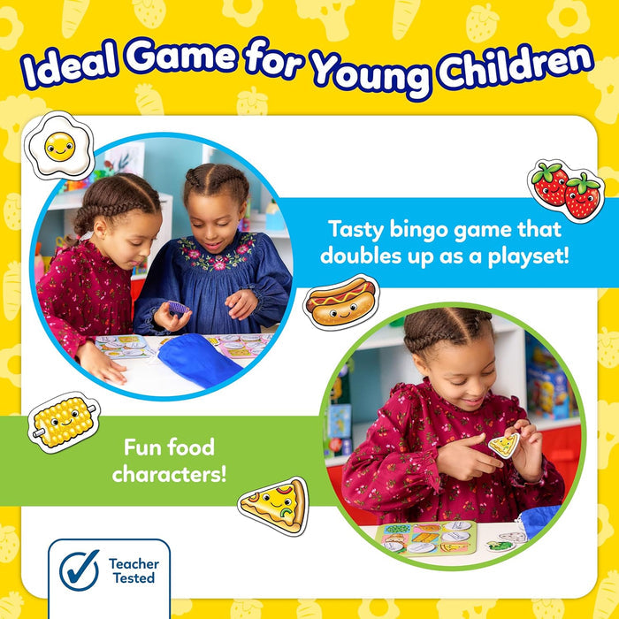 Two girls playing a colorful food-themed bingo game featuring illustrated food characters with smiley faces.