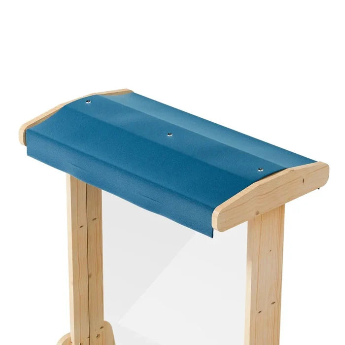 Close-up of a wooden easel with a blue fabric canopy roof and clear acrylic drawing panel.