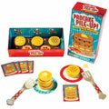 Pancake stacking game set featuring colorful plastic pancakes, toy spatulas, plates, and cards with a vibrant red box.
