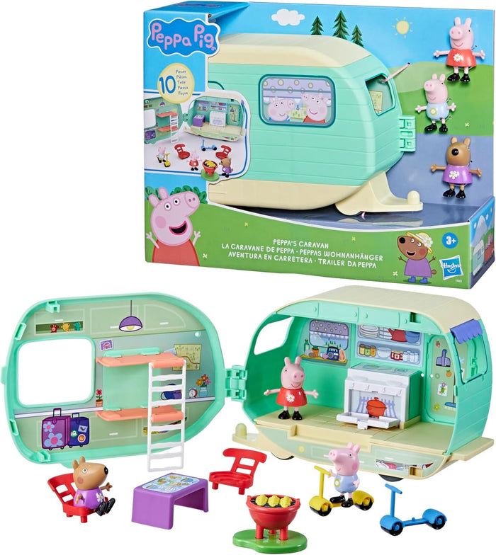 Mint green camper playset and box featuring three figures, scooters, and a fold-out kitchen and bunk bed interior.