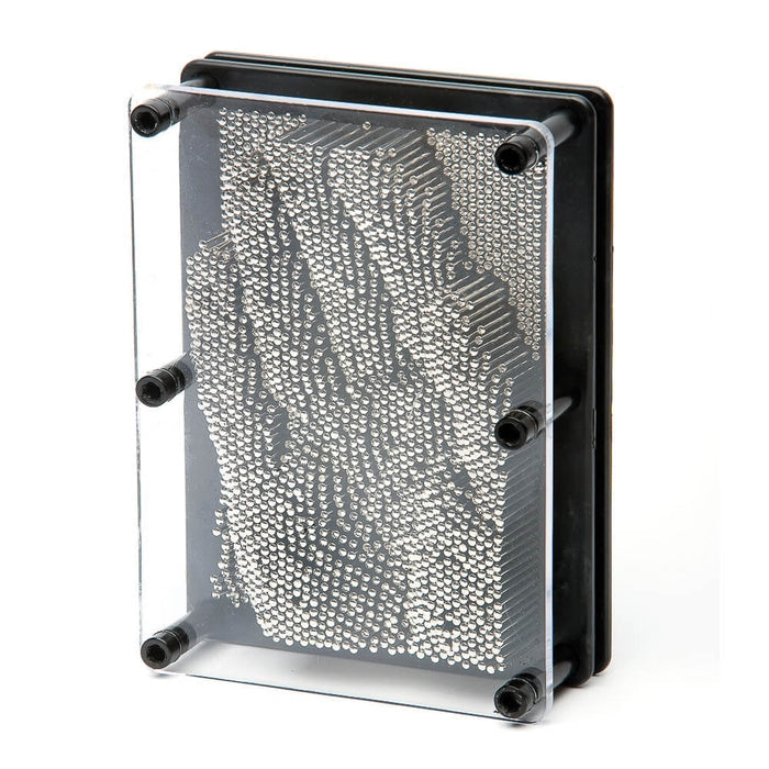 Rectangular black frame with clear front, housing silver metal pins that form a 3D impression of a human hand.