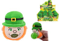 Green leprechaun plush head with orange beard. Hand squeezes it to pop a green jelly ball from its mouth.