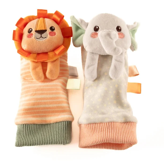 Plush rattles: striped lion with orange ribbon mane and green cuff; dotted grey elephant with pink cuff.