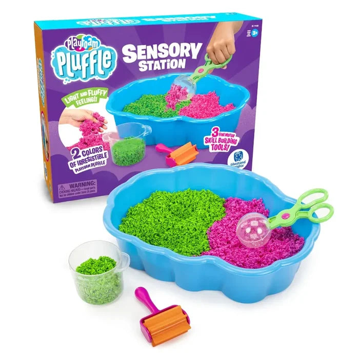 Blue wavy bin with pink and green fluffy foam, a clear scooper, and roller tool next to its colorful product box.