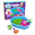 Blue wavy bin with pink and green fluffy foam, a clear scooper, and roller tool next to its colorful product box.
