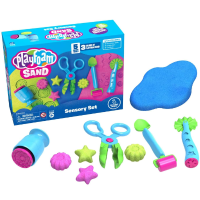 Boxed sensory sand kit with blue sand, pink and green molded shapes, and colorful blue, pink, and green plastic tools.