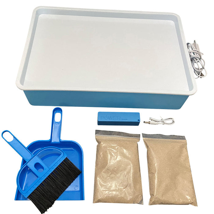 Blue and white rectangular light box with power cord, mini dustpan and brush, power bank, and two bags of sand.