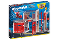 Playmobil 9462 Fire Station box art with a two-story building, red doors, fire helicopter, and three firefighter figures.