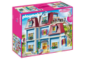 Pink box for Playmobil 70205 Victorian dollhouse in light blue with red roof, spiral stairs, and figures.