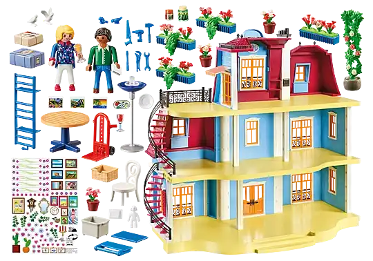 Three-story blue and yellow dollhouse with spiral stairs, two figures, and colorful furniture and flower accessories.