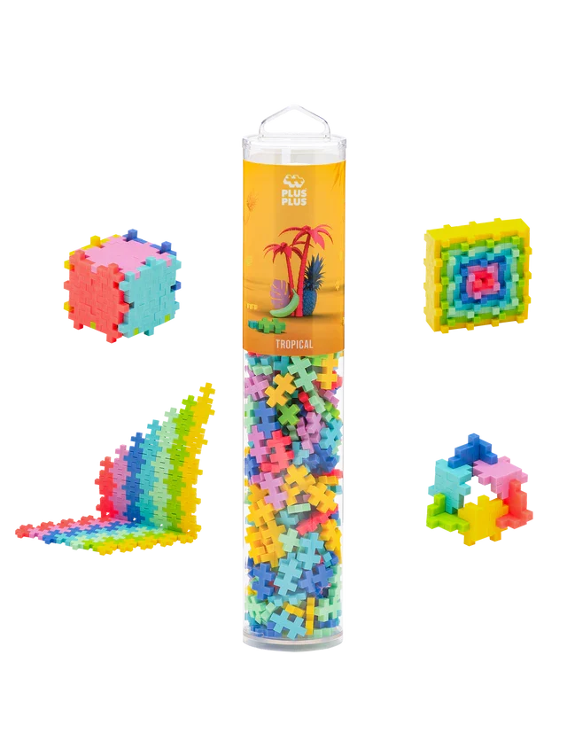 Clear tube of colorful plus-shaped blocks with sample 3D builds including a cube and rainbow wave.