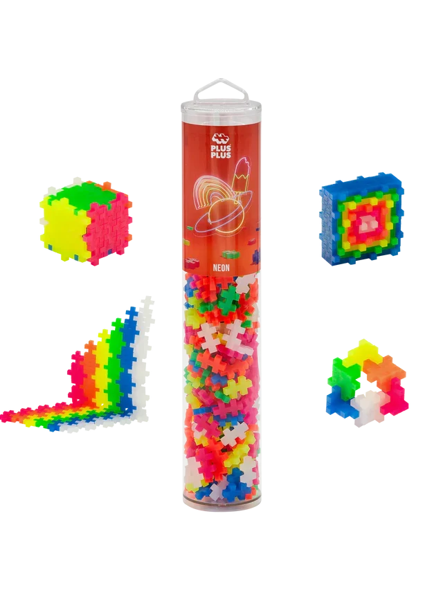 Neon plus-shaped blocks in a clear tube, shown with a colorful cube, rainbow staircase, and geometric shapes.