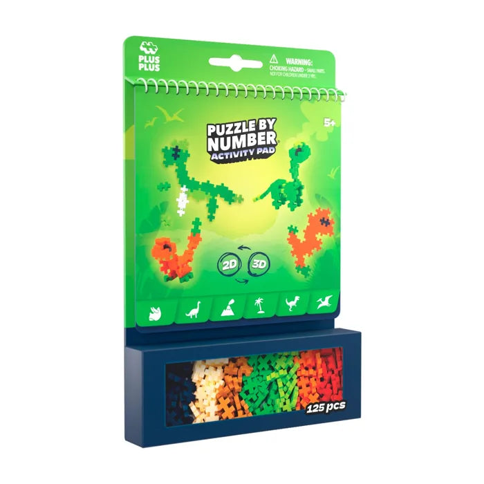 Green dinosaur spiral activity pad and 125 colorful plus-shaped building pieces in a blue windowed base box.